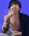  1boy absurdres arm_tattoo artist_name bangtan_boys black_eyes black_hair blue_background commentary covering_own_mouth earrings hand_tattoo hashtag_only_commentary highres jacket jacket_on_shoulders jewelry jung_kook k-pop male_focus multiple_earrings neck_tattoo necklace real_life realistic reiz.i ring sitting solo tattoo topless_male upper_body watermark 