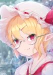  1girl bespectacled blonde_hair blurry blurry_background blush bright_pupils close-up closed_mouth commentary_request double-parted_bangs eyelashes fang flandre_scarlet glasses hair_between_eyes hair_ornament hairclip hat highres kabochamaronpie light_smile looking_at_viewer mob_cap pointy_ears red_eyes round_eyewear short_hair skin_fang slit_pupils solo split_mouth touhou twitter_username white_headwear 