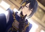 1boy backlighting black_gloves black_hair blue_eyes blurry blurry_background commentary_request eyelashes finger_to_mouth gloves hair_between_eyes japanese_clothes light_particles looking_at_viewer male_focus mikazuki_munechika mochizuki_shiina parted_lips sayagata short_hair shushing smile solo tassel touken_ranbu 