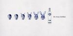  advertisement ambiguous_gender bottle english_text human lagomorph male mammal rabbit text transformation unknown_artist vodka 