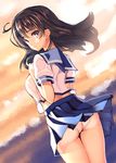  ass black_hair blurry brown_eyes coffee_cat crop_top crop_top_overhang depth_of_field dutch_angle kantai_collection long_hair looking_back midriff panties pleated_skirt school_uniform serafuku skirt skirt_lift solo sunset underwear ushio_(kantai_collection) white_panties wind wind_lift 