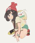  1girl bag black_eyes black_hair creatures_(company) game_freak gen_7_pokemon green_shorts hat highres mizuki_(pokemon) nintendo pokemon pokemon_(creature) pokemon_(game) pokemon_sm red_hat rowlet shoes shorts sneakers unapoppo z-ring 