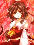  brown_hair detached_sleeves hakurei_reimu midriff nugaa red solo touhou 