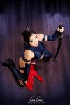  1girl high_heels katana kneeling long_boots marvel photo psylocke short_hair sword weapon x-men yaya_han 