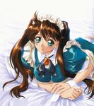  blush breasts brown_hair dengeki_hime green_eyes large_breasts long_hair lying maid maid_headdress on_stomach oohara_mirei pillow ribbon smile solo twintails yokota_mamoru 