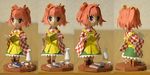  apron bell book checkered ginrin hair_bell hair_ornament highres jingle_bell motoori_kosuzu papercraft red_eyes red_hair short_hair touhou two_side_up wide_sleeves 