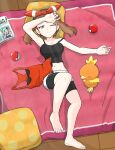  1girl barefoot bike_shorts breasts brown_hair closed_eyes collarbone full_body grey_eyes highres hot lisia_(pokemon) lying magazine_(object) may_(pokemon) navel pillow poke_ball poke_ball_(basic) pokemon pokemon_(creature) pokemon_oras torchic unworn_shirt ya_mari_mo_3 