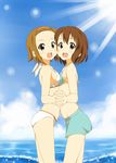  bikini breast_press breasts brown_eyes brown_hair cloud day hairband hamao hirasawa_yui holding_hands interlocked_fingers k-on! light_rays mirror_twins multiple_girls ocean outdoors short_hair sky small_breasts sunbeam sunlight swimsuit symmetrical_docking tainaka_ritsu waves 