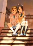  akiyama_mio black_hair brown_eyes brown_hair frog fukutarou_(enji127) grin hairband holding_hands k-on! kneehighs long_hair multiple_girls shoes short_hair sitting sitting_on_stairs skirt smile socks stairs statue sweater_vest tainaka_ritsu uwabaki yuri 