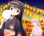  akemi_homura black_hair cotton_candy double_bun festival floral_print flower garland_(decoration) hair_down hairband head_tilt japanese_clothes kaname_madoka lampion lantern light long_hair looking_at_another looking_at_viewer looking_back mahou_shoujo_madoka_magica multiple_girls night night_sky outdoors pink_hair purple_eyes short_hair sky smile spider_lily teina 