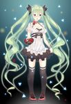  absurdly_long_hair blush box breasts candy cleavage food green_eyes green_hair hatsune_miku heart-shaped_box highres long_hair seedkeng solo twintails very_long_hair vocaloid 