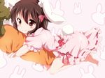  animal_ears bow brown_hair bunny_ears carrot carrot_pillow hair_bow inaba_tewi maruki_(punchiki) pillow pillow_hug red_eyes short_hair solo touhou 