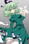  1girl dress ghost_tail green_dress green_eyes green_hair hat isa japanese_clothes juliet_sleeves long_sleeves puffy_sleeves short_hair soga_no_tojiko solo tate_eboshi touhou 