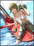  aqua_eyes bare_shoulders bikini_top border brown_hair clothes_around_waist collarbone gloves helmet highres kuratch lips looking_at_viewer navel ocean original pants pants_rolled_up parted_lips shirt_around_waist short_hair soaking_feet solo water windowboxed 