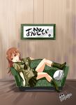  brown_eyes brown_hair couch highres imu_sanjo kantai_collection long_hair looking_at_viewer lying ooi_(kantai_collection) open_mouth pillow pleated_skirt school_uniform serafuku skirt solo translated 