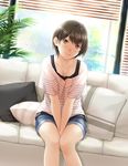  bad_id bad_pixiv_id blinds blouse blush brown_eyes brown_hair collarbone couch cushion head_tilt indoors looking_at_viewer nayuta69 original plant short_hair short_sleeves shorts sitting smile solo striped_blouse tank_top v_arms window 
