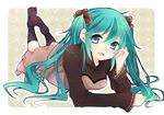  dress green_hair hatsune_miku long_hair lying on_stomach ryuuga_sazanami scrunchie socks solo twintails vocaloid 