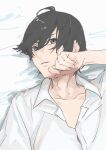  1boy ahoge araragi_koyomi bed_sheet black_hair brown_eyes collarbone collared_shirt commentary curled_fingers dress_shirt from_above hair_between_eyes hand_on_own_cheek hand_on_own_face hand_up highres looking_at_viewer lying male_focus messy_hair monogatari_(series) on_back on_bed parted_lips shirt usa003uni white_shirt 