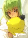  c.c. cheese-kun code_geass creayus green_hair hat hug long_hair looking_at_viewer mini_hat solo twitter_username yellow_eyes 