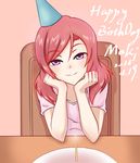  candle chair character_name chin_rest dated eyebrows_visible_through_hair half-closed_eyes happy_birthday hat looking_at_viewer love_live! love_live!_school_idol_project nishikino_maki nuenya party_hat pink_background pink_shirt purple_eyes red_hair shirt short_sleeves simple_background sitting smile solo t-shirt 