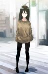  1girl black_hair black_pantyhose blurry blurry_background breasts brown_sweater building closed_mouth commentary_request crosswalk full_body green_eyes highres inami_hatoko long_hair long_sleeves looking_at_viewer medium_breasts original pantyhose sleeves_past_elbows solo standing sweater 