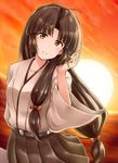  brown_hair brown_skirt dusk hair_ribbon japanese_clothes kamelie kantai_collection long_hair looking_at_viewer low-tied_long_hair ocean pleated_skirt ribbon shouhou_(kantai_collection) skirt smile solo sunset upper_body 