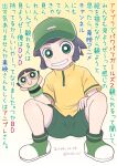  1girl baseball_cap black_hair blue_eyes buttercup_(ppg) commentary_request dated green_footwear green_shorts grin hand_puppet hat highres matsubara_kaoru mochi-iri_kinchaku polo_shirt powerpuff_girls powerpuff_girls_z puppet shoes short_hair shorts smile solo squatting translation_request twintails 