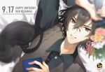  1boy black_cat black_eyes black_hair black_shirt blurry_edges bouquet cat character_name collared_shirt commentary_request copyright_name flower glass hair_between_eyes happy_birthday holding holding_bouquet kisaragi_ren_(mahjong_soul) kotsuru_kari logo looking_at_viewer lying mahjong mahjong_soul male_focus official_art official_wallpaper on_back orange_flower pink_flower rimless_eyewear shirt sweater_vest tenbou 