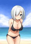  arms_behind_back beach bikini black_bikini black_bikini_bottom blue_eyes breasts cleavage cloud day don_(29219) hair_ornament hair_over_one_eye hairclip hamakaze_(kantai_collection) kantai_collection large_breasts looking_at_viewer navel ocean outdoors shore short_hair silver_hair sky smile solo swimsuit water 
