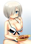  bikini blue_eyes breasts cleavage food gradient gradient_background hair_ornament hair_over_one_eye hamakaze_(kantai_collection) kantai_collection large_breasts looking_at_viewer short_hair sitting smile solo strap_gap sudo_shinren swimsuit takoyaki 