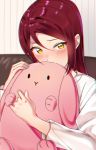  1girl blush couch covered_mouth holding holding_stuffed_animal holding_stuffed_toy long_sleeves looking_at_viewer love_live! love_live!_sunshine!! red_hair sakurauchi_riko sellel shirt solo striped striped_background stuffed_animal stuffed_bunny stuffed_toy white_shirt yellow_eyes 