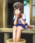  ame. basin black_hair bowl brown_eyes check_commentary commentary_request fubuki_(kantai_collection) kantai_collection long_hair school_uniform serafuku sitting soaking_feet solo tomato water 