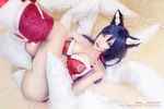 1girl animal_ears breasts cosplay fox_ears league_of_legends multiple_tails panties photo tail tails underwear 