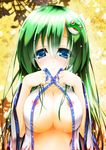  areola_slip areolae blue_eyes blush breast_lift breast_squeeze breasts collarbone covered_nipples detached_sleeves frog_hair_ornament green_hair hair_ornament highres kochiya_sanae large_breasts long_hair looking_at_viewer messy_hair no_bra petals solo special_tan touhou undressing upper_body yellow_background 
