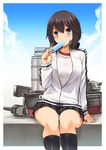  aaru_(tenrake_chaya) black_hair black_legwear black_skirt blush cannon food gym_shirt hayasui_(kantai_collection) jacket kantai_collection kneehighs looking_at_viewer miniskirt pleated_skirt popsicle shirt short_hair silver_eyes sitting skirt solo track_jacket zipper 