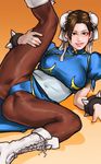  bracelet brown_hair bun_cover chinese_clothes chun-li double_bun highres jewelry pantyhose sash spiked_bracelet spikes street_fighter take_(draghignazzo) 