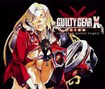  album_cover between_legs blonde_hair bottomless breasts cleavage cover fingerless_gloves gloves guilty_gear guilty_gear_xrd hand_between_legs highres ishiwatari_daisuke large_breasts lips long_hair midriff millia_rage no_bra nose official_art out-of-frame_censoring solo underboob 