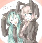  animal_ears animal_hood aqua_hair bad_id bad_pixiv_id blue_eyes blush bunny_ears cat_hood closed_eyes hatsune_miku hijiki_(hijikini) hood hoodie long_hair megurine_luka multiple_girls pink_hair vocaloid 