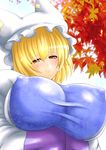  animal_ears autumn_leaves blonde_hair blush breast_hold breasts commentary_request covered_nipples dutch_angle fox_ears frills from_below hat huge_breasts japanese_clothes kitsune looking_at_viewer pillow_hat short_hair smile solo tabard touhou wontam yakumo_ran yellow_eyes 