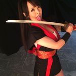  1girl asian breasts hitomi_tanaka huge_breasts photo solo sword weapon 