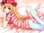  american_flag_dress american_flag_legwear ass bed_sheet blonde_hair clownpiece dress hat highres jester_cap legs_up long_hair lying microdress neck_ruff on_bed on_stomach open_mouth pantyhose pillow pointing polka_dot qunqing red_eyes short_sleeves smile solo star star_print striped striped_dress touhou 