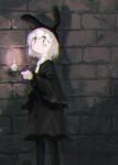  1girl animal_ears black_dress brick_wall candle chromatic_aberration closed_mouth commentary_request dress fake_animal_ears feet_out_of_frame hand_up highres holding holding_candle kezuru long_sleeves looking_to_the_side original rabbit_ears solo standing white_hair |_| 