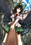  :&lt; arm_cannon black_wings bow breasts brown_hair frills from_below green_bow hair_bow hands large_breasts large_wings long_hair red_eyes reiuji_utsuho shigurio solo stone_wall touhou wall weapon wings 