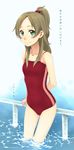  2015 against_railing arm_behind_back blurry brown_hair collarbone competition_swimsuit covered_navel depth_of_field green_eyes hair_bobbles hair_ornament highres long_hair looking_at_viewer minamino_kanade one-piece_swimsuit ponytail precure red_swimsuit sakura_kotetsu shochuumimai smile solo standing suite_precure swimsuit wading water 