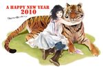  2010 bad_id bad_pixiv_id black_hair boots copyright_request hug new_year scarf short_hair solo sumishuu tiger 