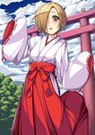  :d alternate_costume animal blonde_hair cloud day hair_over_one_eye hakama highres idolmaster idolmaster_cinderella_girls japanese_clothes long_sleeves looking_at_viewer miko monkey open_mouth outdoors red_eyes red_hakama ribbon-trimmed_sleeves ribbon_trim shirasaka_koume short_hair sky sleeves_past_fingers sleeves_past_wrists smile solo standing standing_on_one_leg takanashi-a torii tree 
