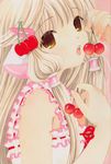  blonde_hair brown_eyes cherry chii chobits clamp food food_themed_clothes fruit highres holding holding_food holding_fruit long_hair looking_at_viewer open_mouth robot_ears solo 