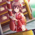  1girl alternate_costume blush brown_hair closed_mouth ema eyebrows_visible_through_hair floral_print hair_ornament hatsumoude highres japanese_clothes kantai_collection kimono kisaragi_(kantai_collection) long_hair long_sleeves minakami_mimimi new_year obi outdoors print_kimono purple_eyes purple_ribbon red_kimono ribbon rope sash shrine smile solo wide_sleeves 