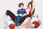  2girls adjusting_hair armpits arms_behind_head arms_up boots breast_envy breasts brown_eyes brown_hair bun_cover chinese_clothes chun-li cleavage crossover curvy double_buns fatal_fury japanese_clothes king_of_fighters kndy kneeling large_breasts long_hair looking_at_viewer multiple_girls pelvic_curtain puffy_sleeves shiranui_mai short_hair sitting smile spread_legs street_fighter thick_thighs wide_hips 