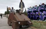  beard dom facial_hair fighter gundam nato photo road robot tank vehicle weapon 